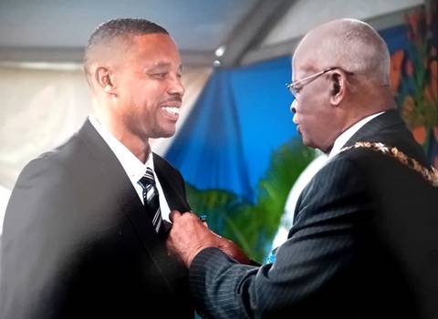 Lennux Ferdinand receiving the Barbados Bravery Medal in 2014